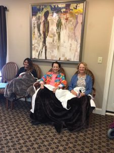 Patients covered by blankets, relaxing and sitting in the waiting room. Dunwoody, GA.