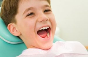 Child in Dentist Chair Smiling Dunwoody GA