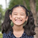 smiling girl in the garden